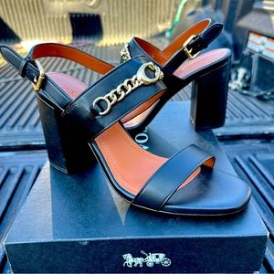 Black coach heeled sandals